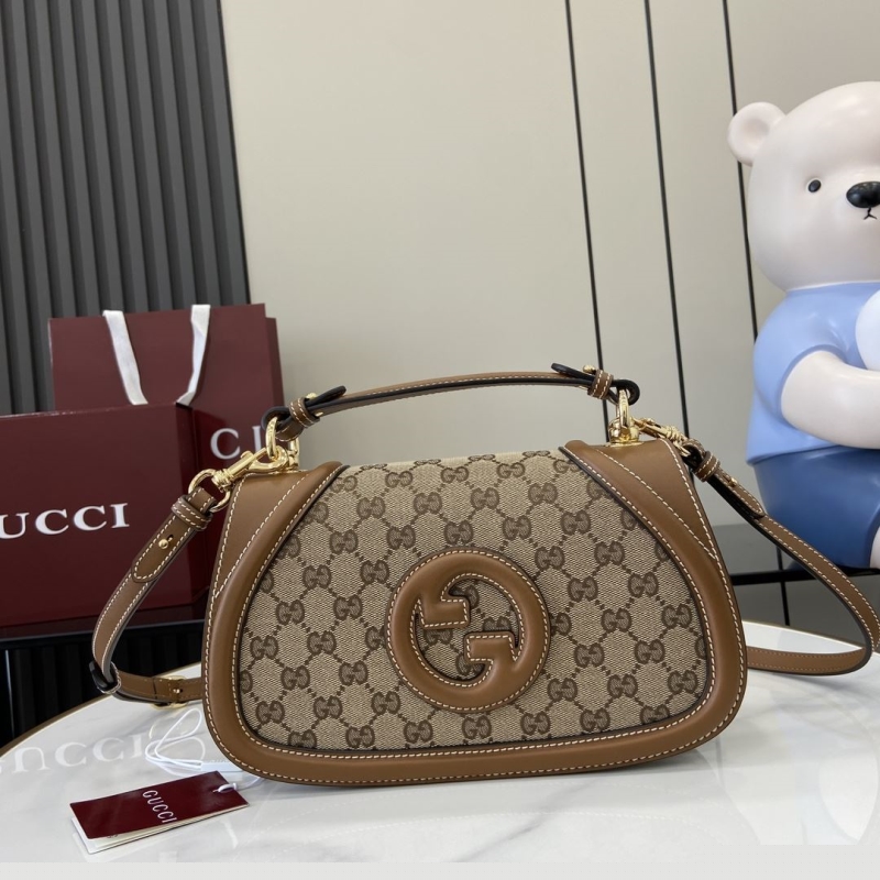 G*u*i top handle bags
